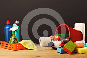 Variety of house cleaning products on table