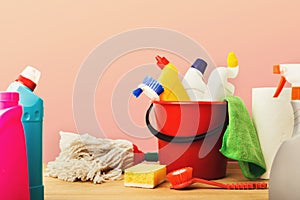 Variety of house cleaning products on table