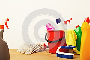 Variety of house cleaning products on table