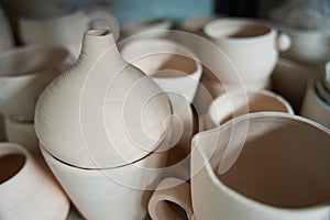 Variety of household unbaked clay products close-up