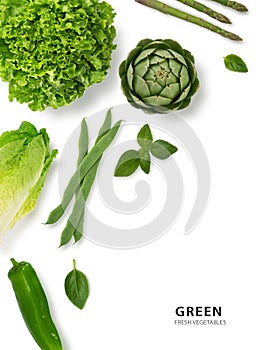 Variety of leafy green vegetables isolated on white background.