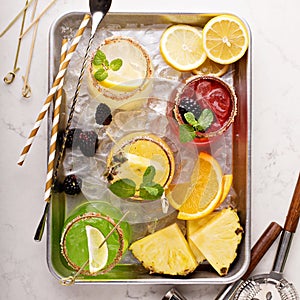 Variety of margarita cocktails on a tray