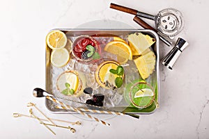 Variety of margarita cocktails on a tray