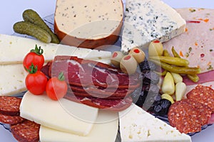 Variety of meat products and cheese