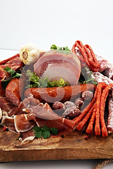 Variety of meat products including ham and sausages