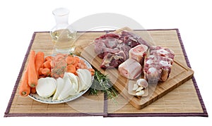 Variety of meat, vegetables and wine