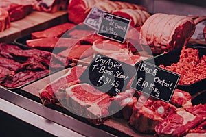 Variety of meats on sale at a market stall in London, UK