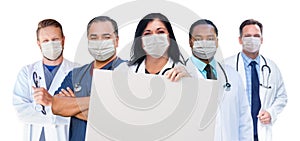 Variety of Medical Healthcare Workers Wearing Medical Face Masks Holding Blank Sign Amidst the Coronavirus Pandemic