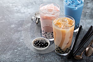 Variety of milk bubble tea in tall glasses