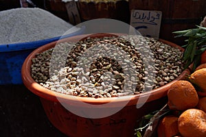 Variety organic fava beans on sale on a farmers market. Traditional arabic market