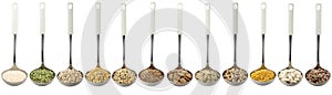 Variety of raw legumes and rices in ladles - white background