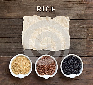 Variety of rice with craft paper and word Rice