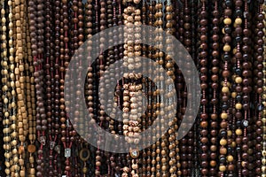 Variety of rosaries in a store selling religious products