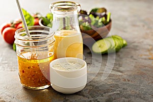 Variety of sauces and salad dressings photo