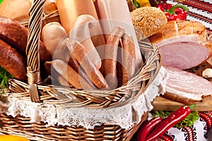 Variety of sausage products in basket.