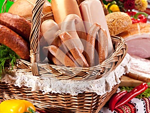 Variety of sausage products in the basket.