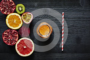 Variety of sliced fruit and freshly pressed juice