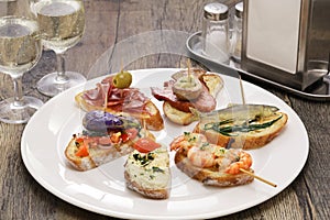 Variety of spanish pinchos italian cicchetti