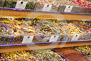 A variety of spices and savories on the counter at the store. Variety of aromatic spices in stores