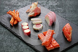 Variety of surimi products, imitation crab sticks photo