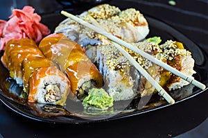 Variety of sushi rolls on a plate