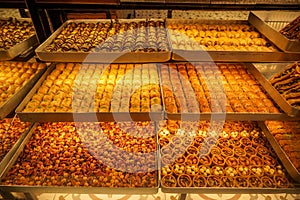 Variety of sweet Baklava, traditional turkish famous delicious dessert in tray showcase of local shop in Istanbul