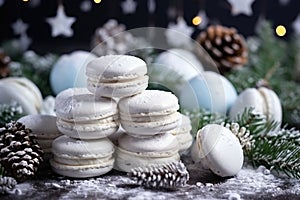 Variety of sweet macaroons. The branches of spruce on bokeh background. Modern european French cuisine. Christmas theme