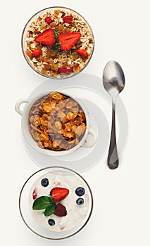 Set of bowls with breakfast meals, isolated