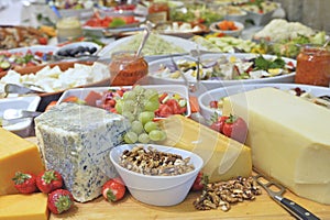 Variety of tasty and fresh food on table close up