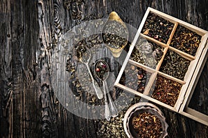 Variety of teas, mixes in copper dish, topview