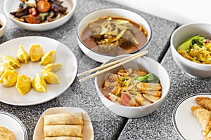 Variety of Tempting Chinese Dishes Displayed on Cafe Table