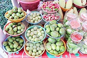 Variety of tropical fruit on basket for sell at On Nut, Bangkok, Thailand