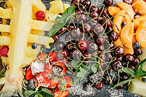 variety tropical fruits tray sliced â€‹â€‹pineapple cherries