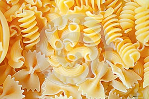 Variety of types and shapes of dry Italian pasta