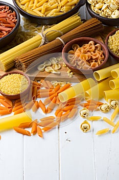 Variety of types and shapes of dry italian pasta