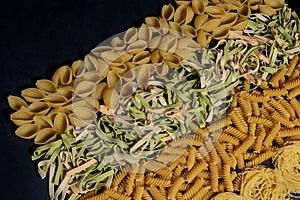 Variety of types and shapes of dry Italian pasta. Italian Macaroni raw food background or texture:pasta, spaghetti , pasta in