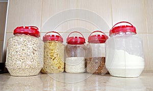 Varios dry food, seeds in bottles photo