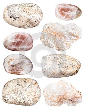 Various albite gem stones isolated on white