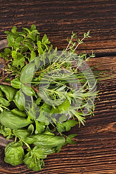 Various aromatic culinary herbs, rustic style.