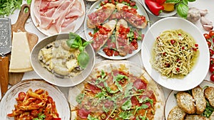 Various assorted Italian food served on a plates