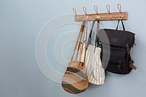 Various bags hanging on hook