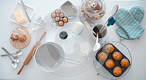 Various baking products on kitchen counter from above. Baking utensils on a kitchen table. Still life of food and