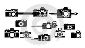 Various black camera icon designs, white background.