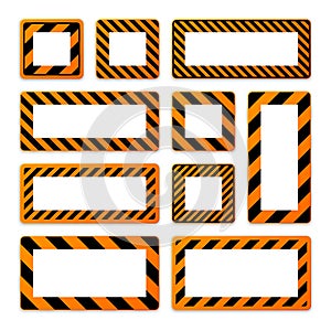 Various blank warning signs with diagonal lines. Orange attention, danger or caution sign, construction site signage