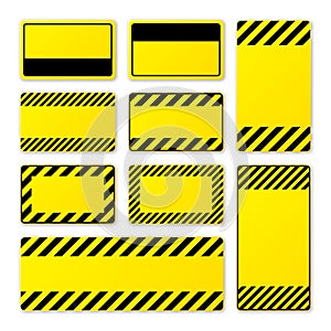 Various blank yellow warning signs with diagonal lines. Attention, danger or caution sign, construction site signage