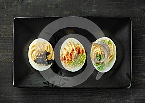 Various boiled stuffed eggs