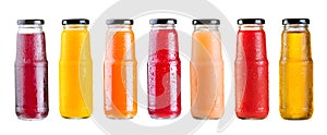 Various bottles of juice isolated on white background