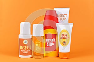 Various bottles and tubes with insect repellent products with made up labels