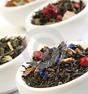 Various bowls of premiun tea leaves blends