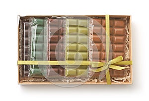 Various chocolate bars set in paper box